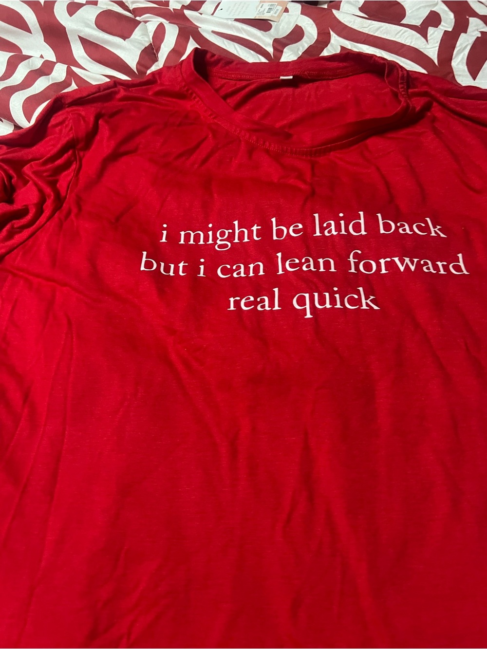 Six shirts. Source Unknown Red Short Sleeve Tee with White Text and other shirts